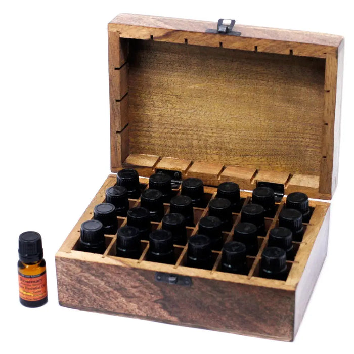 Wooden mango wood aromatherapy box with 24 black-capped essential oils bottles and one amber rosemary bottle beside it