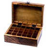 A carved mango wood aromatherapy box with 16 compartments and black metal hinges for essential oils storage