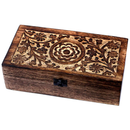 A rectangular dark brown mango wood aromatherapy box with intricate floral carvings holds 10ml bottles with approximate diameter