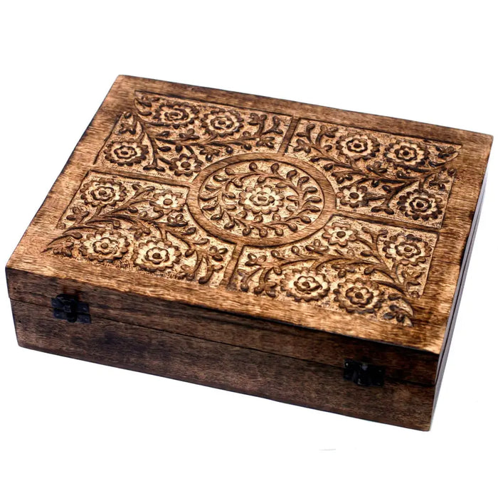 A rectangular mango wood aromatherapy box with floral carvings and dark metal hinges that holds 80 items