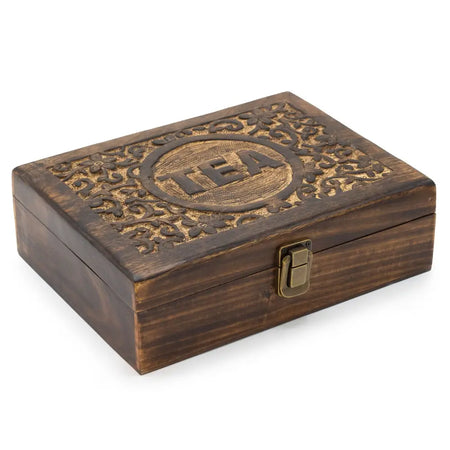 Dark brown carved mango wood tea box with 12 compartments and a brass latch for organized tea storage