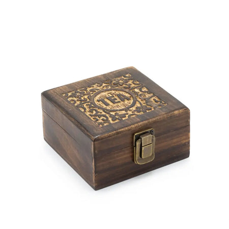 Dark brown carved mango wood tea box with gold leaf design and brass latch featuring four compartments