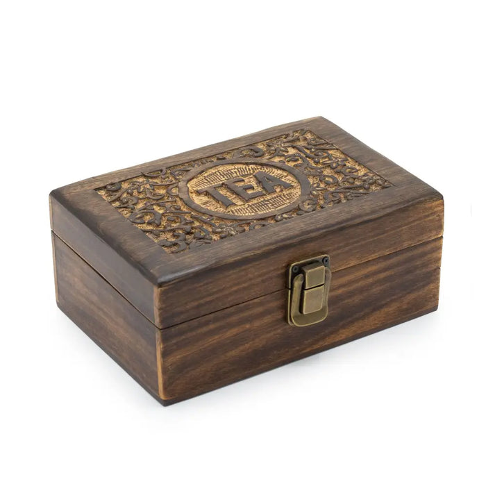 Dark brown mango wood tea box with six compartments carved with floral patterns and a brass clasp