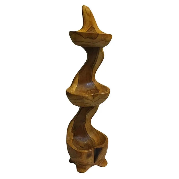 A tall teak carved wooden standing bowl shelf with three tiered levels and a warm golden brown finish