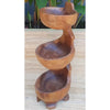 Hand carved wooden spiral tiered bowl with three rounded teak compartments and a natural wood finish