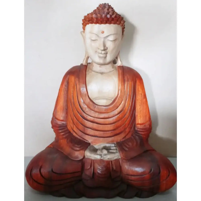 A 40cm carved suar wood buddha statue with a white face and reddish-brown robe seated in meditation