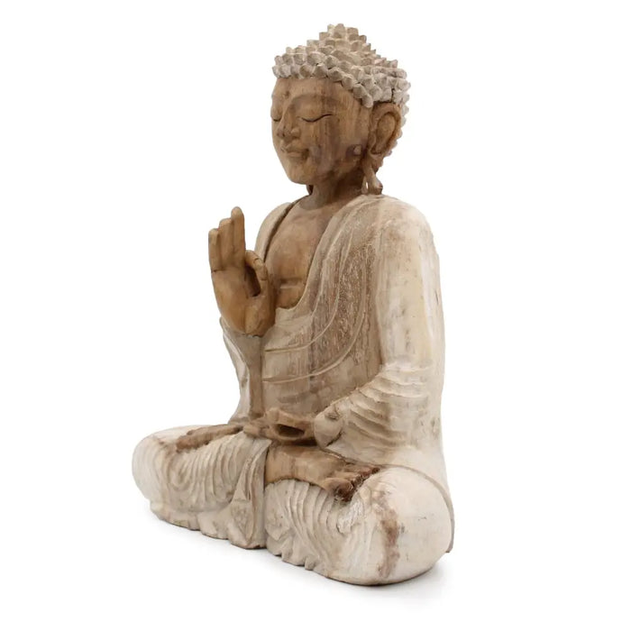 Hand-carved suar wood buddha statue with serene expression detailed robes and ushnisha in natural light brown tones