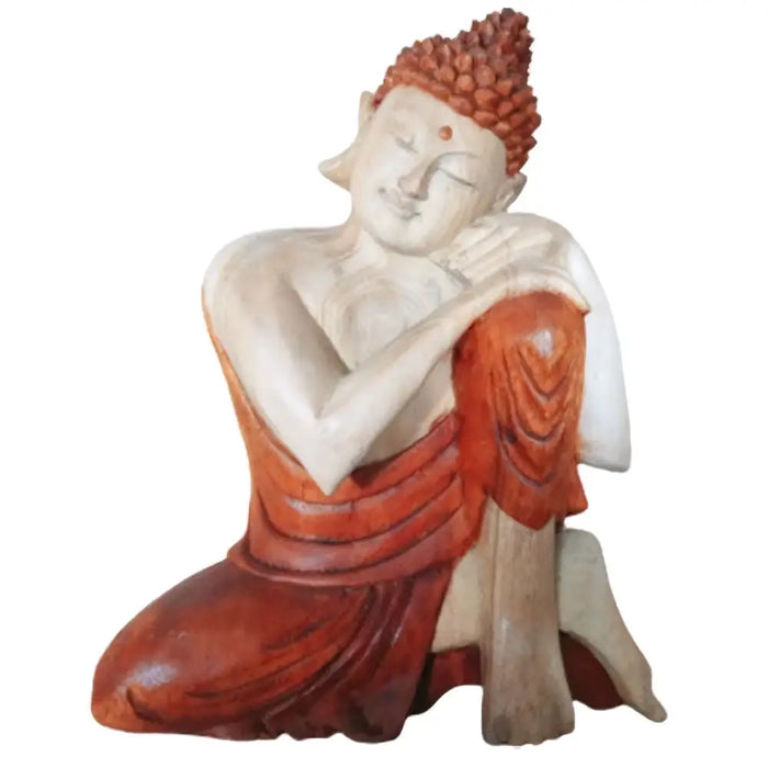 Carved wood buddha statue thinking with serene expression in orange robes and red crown made from suar wood 25cm tall
