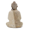 A weathered off-white carved wood buddha statue with textured head and crackled robes made from suar wood 40cm tall