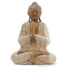 Hand carved suar wood buddha statue in whitewash finish seated in meditative pose with flowing robes 40cm tall