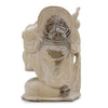 A carved stone statue of a kneeling figure holding a starburst shield next to a whitewash carved wood happy buddha in suar wood