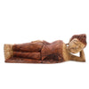 Hand carved reclining buddha statue in suar wood with detailed robes and serene expression 50cm long