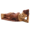 Carved wood sleeping buddha statue with detailed face and dark brown textured hair made from suar wood 50cm tall