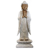 A serene carved wood standing buddha statue in whitewash finish made from suar wood on a lotus pedestal