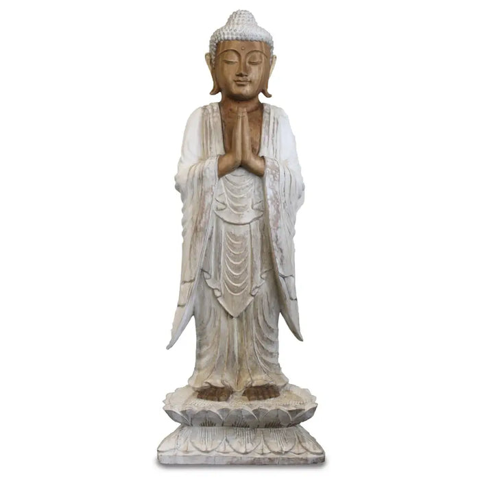 A serene carved wood standing buddha statue in whitewash finish made from suar wood on a lotus pedestal