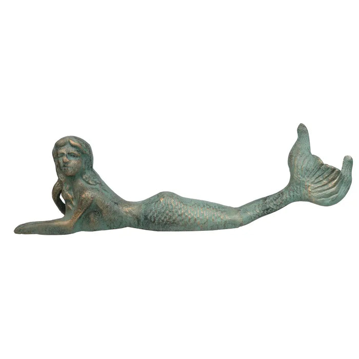A cast metal verdigris bronze mermaid figure with detailed scales and a flowing tail lying in a relaxed pose