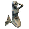 Bronze cast metal mermaid figurine with detailed scales and flowing hair posed seated as decorative figure
