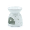 White ceramic oil burner with star cutouts and glossy finish for aromatherapy and home use