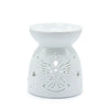 White ceramic oil burner shaped like an angel with star and wing cutouts for holding scented oils