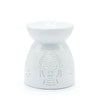 White ceramic oil burner with buddha theme and intricate perforated design for aromatherapy use