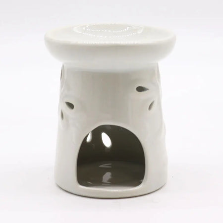 White ceramic oil burner with glossy finish and dragonfly cut-out patterns on the sides for oil burners use