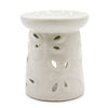 White ceramic oil burner with decorative leaf cutouts designed for use as a ceramic oil burner dragonfly style