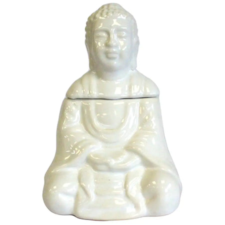 White ceramic oil burner shaped like a seated buddha with smooth glossy finish for meditation and relaxation