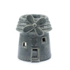 Gray ceramic oil burner shaped like a windmill with textured roof and decorative windows for home use
