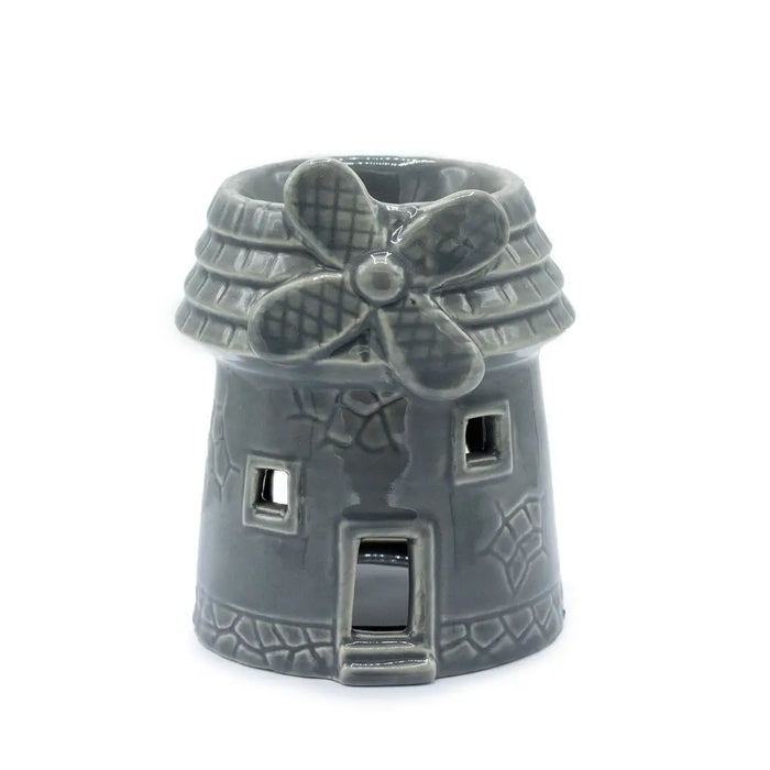 Gray ceramic oil burner shaped like a windmill with textured roof and decorative windows for home use