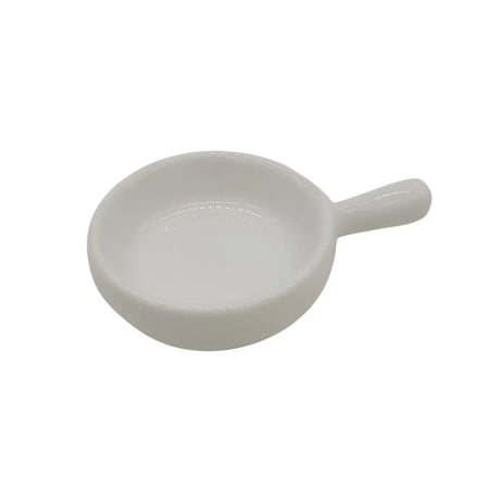 White ceramic tealight spoon with a glossy finish and small handle for holding and lighting tealights
