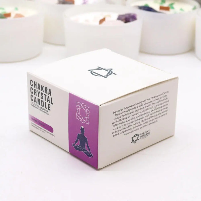 White and purple chakra crystal candle box with a meditating figure for crown chakra spiritual connection