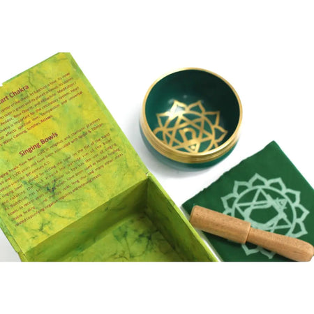 Green chakra singing bowl with gold geometric design made for heart chakra meditation and healing practice