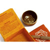 Golden brass chakra singing bowl with engraved lotus and sacral chakra symbol for chakra singing use