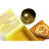 Golden brass chakra singing bowl with detailed solar plexus chakra symbol etched inside for meditation use