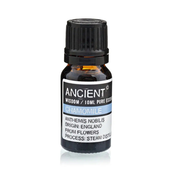 A small amber glass bottle of ancient wisdom roman chamomile essential oil with a black cap and white label 10ml