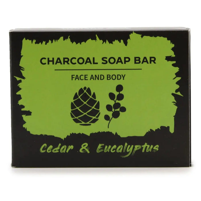 Charcoal soap bar with activated charcoal in black and lime green packaging scented with eucalyptus and cedarwood for face and body