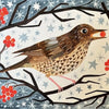 A christmas card pack featuring a brown song thrush with a speckled breast holding a red berry on snowy branches
