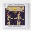 A bronwen tyrrell christmas card pack featuring a vintage black and gold card of two women in swimsuits by the sea
