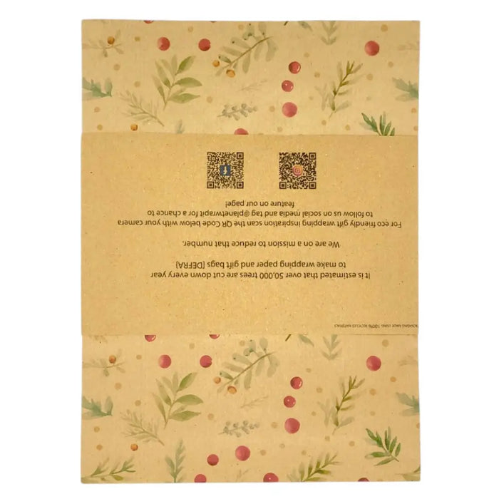 Beige recycled kraft wrapping paper with green leaves and red berries botanical pattern for gift wrapping