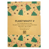 Brown recycled kraft wrapping paper with green christmas trees pink bows and black stars on kraft paper sheet