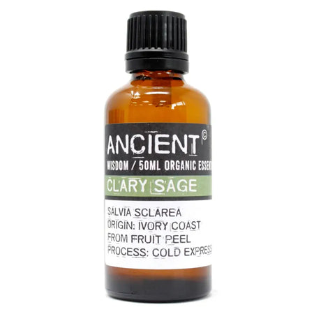 An amber glass bottle of clary sage essential oil with a black ribbed cap and a label showing 50ml organic oil