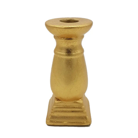 Classic gold ceramic candle holder with ornate design and textured finish made for holding candles