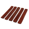 Set of five polished reddish-brown mango wood ashcatchers with a smooth curved design and subtle grooves