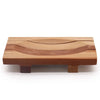 A rectangular light brown naseberry wood soap dish with smooth curved grooves for drainage and grid drainer design