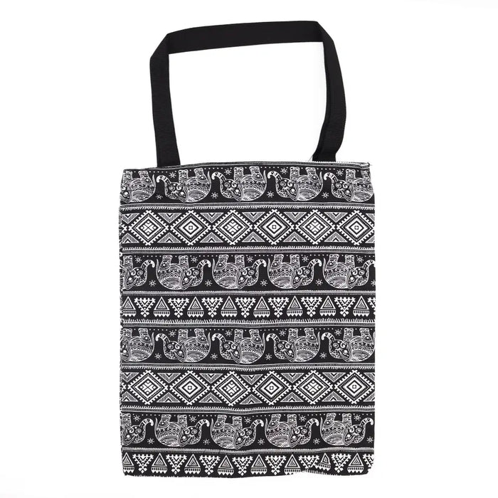 Black canvas classic tote zipper bag with white embroidered elephant and geometric pattern