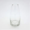 Clear glass reed diffuser bottle with a slender tapered shape and slightly flared rim made of clear glass