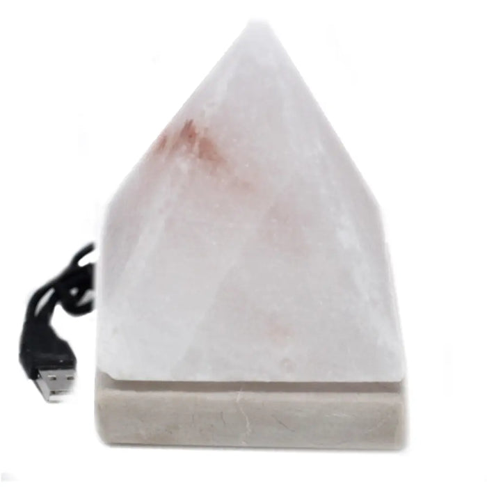 A white pyramid-shaped usb crystal rock himalayan salt lamp with a pinkish hue and smooth crystalline surface highlighting hygroscopic properties
