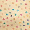 Pastel watercolor polka dot pattern on textured cream recycled kraft paper gift wrap folded in an a4 sheet