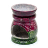 A hand-carved coloured soapstone oil burner with maroon and green body featuring white elephant etchings and om symbol