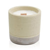 Beige and gray textured concrete candle pot with white wax candle and wooden wick for coffee in the club vibe